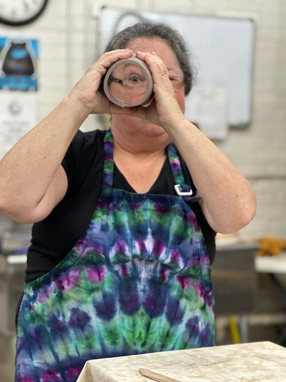 Karen Dubois peeking through slab cylinder Karen Dubois peeking through slab cylinder