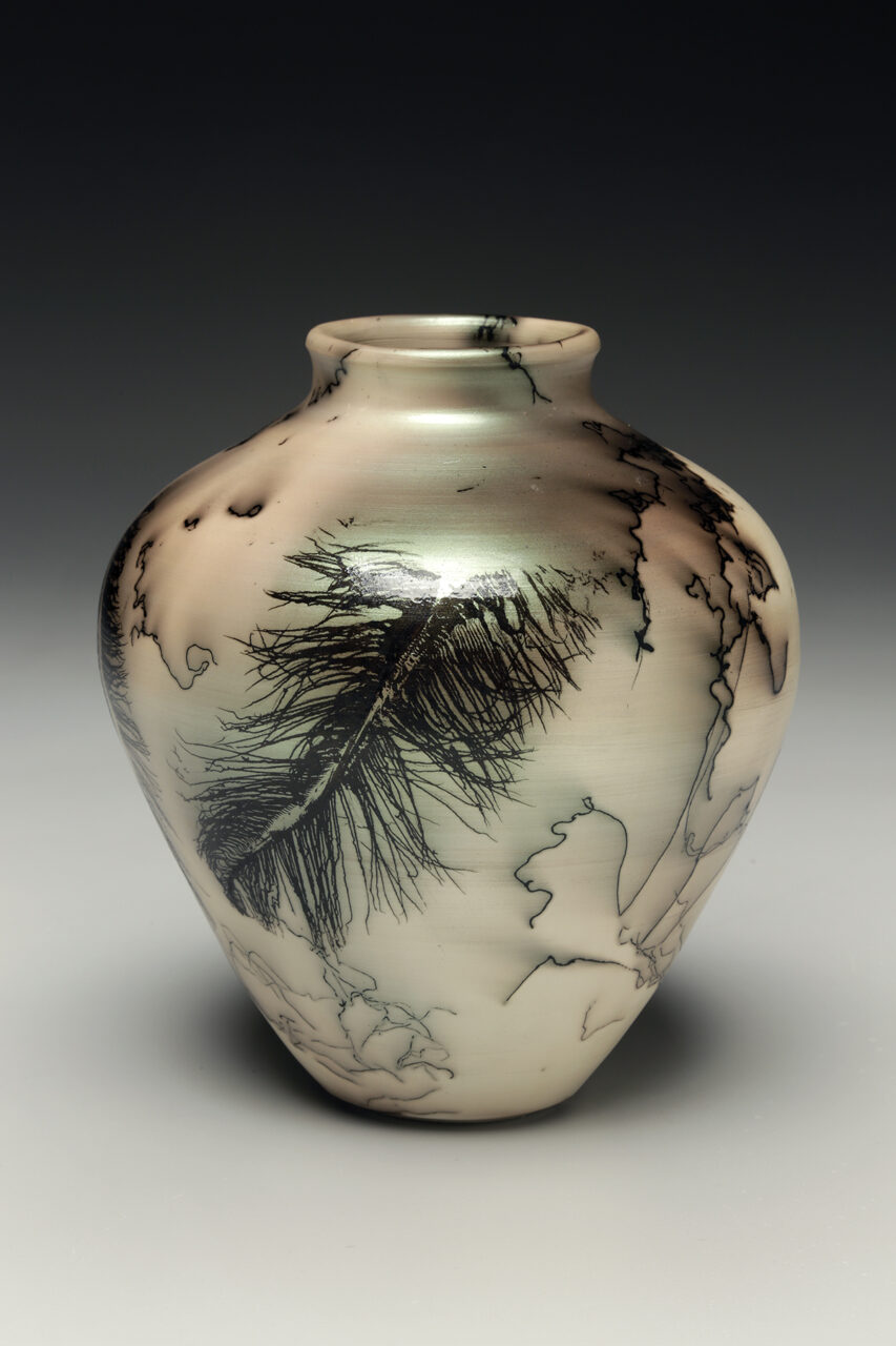 Judi Harwood finished pot, green mica and horsehair raku pot, feather Judi Harwood finished pot, green mica and horsehair raku pot, feather