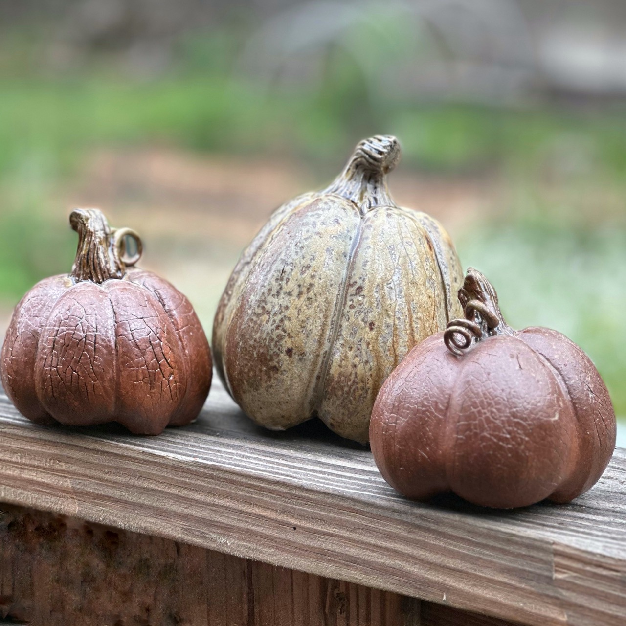 Karen Dubois finished pots, kazie wood soda fired pumpkins, trio grouping Karen Dubois finished pots, kazie wood soda fired pumpkins, trio grouping
