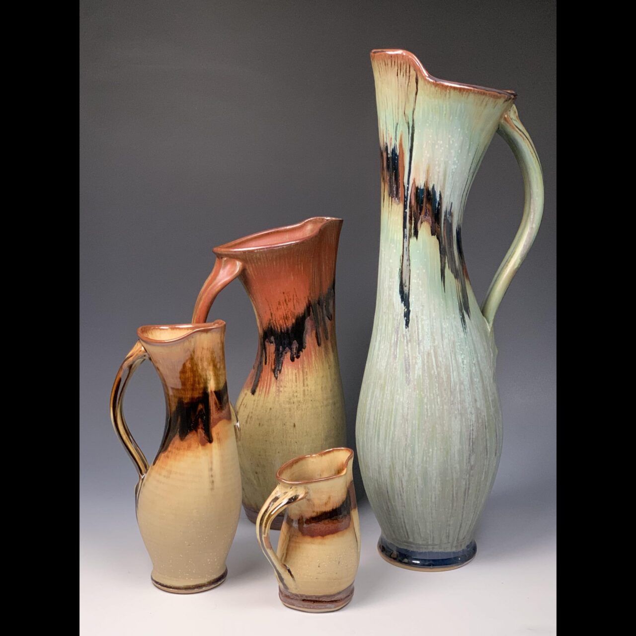 Sarah Wells Rolland finished pots grouping, dancing pitcher in various sizes Sarah Wells Rolland finished pots grouping, dancing pitcher in various sizes