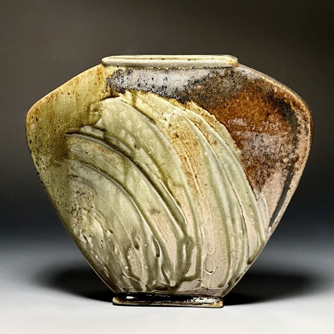 Sarah Wells Rolland finished hand built pot, sea grass slip decoration, kazie wood soda fired Sarah Wells Rolland finished hand built pot, sea grass slip decoration, kazie wood soda fired