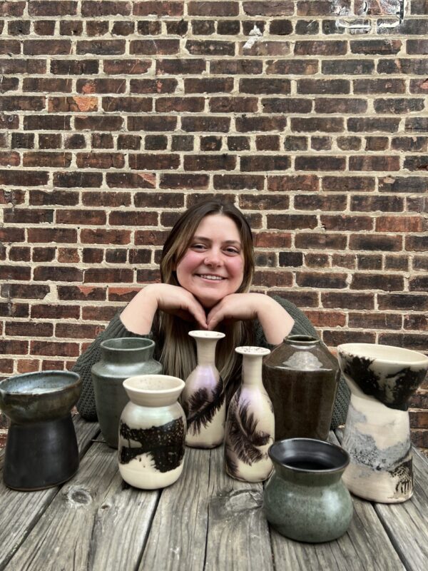 Kyra Pruitt with her finished pots
