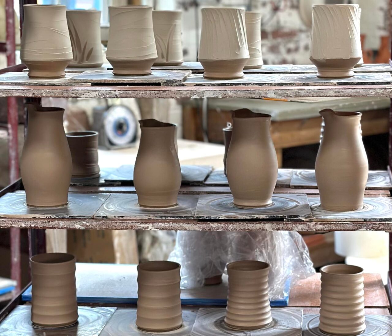 Sarah Wells Rolland fresh thrown pots on ware cart abundance, our stock image Sarah Wells Rolland fresh thrown pots on ware cart abundance, our stock image