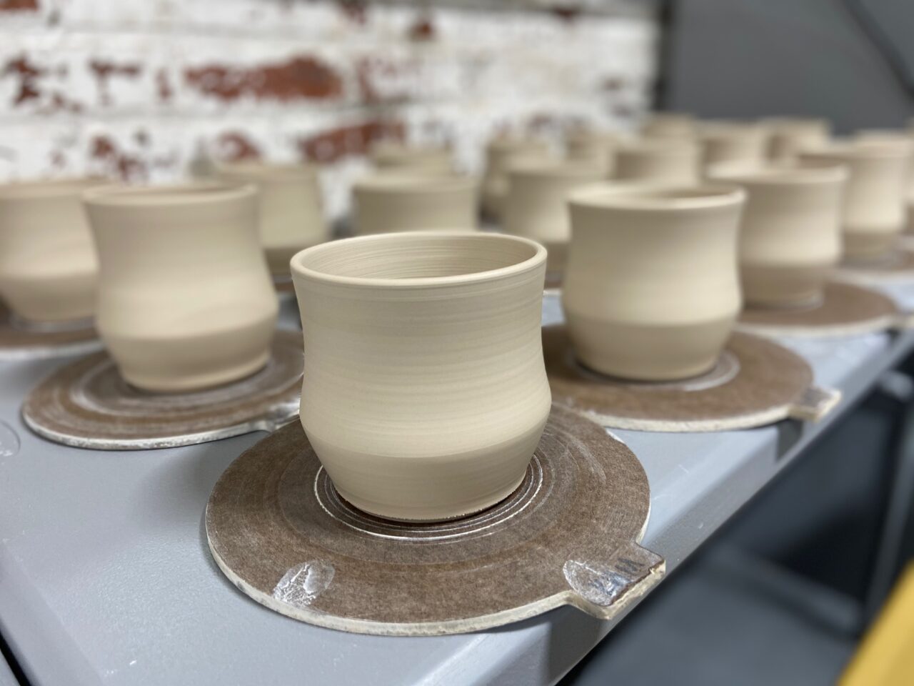 Katie Meili Messersmith fresh thrown cups, white clay, our stock image 1 Katie Meili Messersmith fresh thrown cups, white clay, our stock image 1